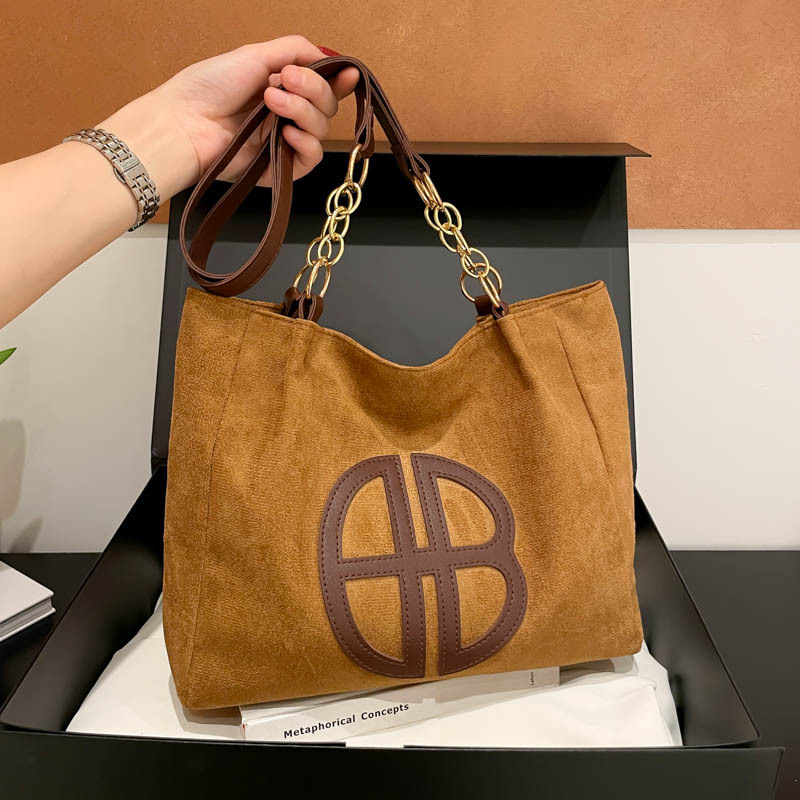 Gran capacidad retro 2025 nuevo estilo ocio simple de piel de ciervo viaje de moda ocio de hombro bolsa de mano para mujeres