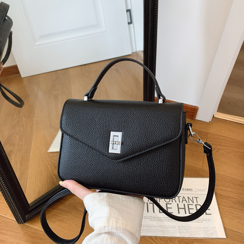 Bolso mensajero de lujo ligero de nicho 2025 nuevo bolso femenino de gran capacidad moda retro simple bolso cuadrado pequeño femenino