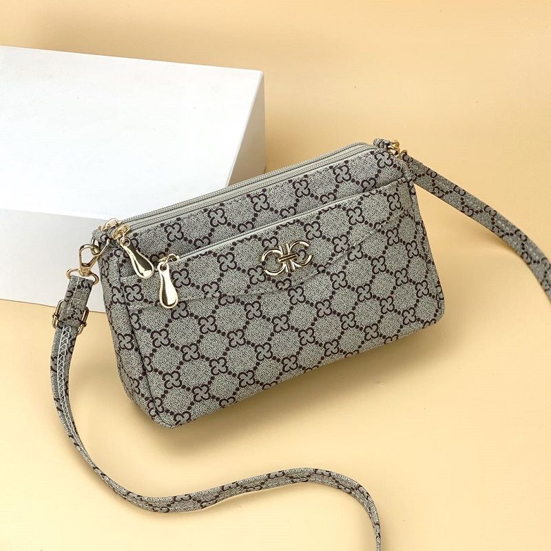 Guangzhou Hengli 2024 nuevo bolso de mensajero transfronterizo bolso casual de mediana edad bolso de teléfono móvil para mujer bolso de venta caliente bolso de hombro