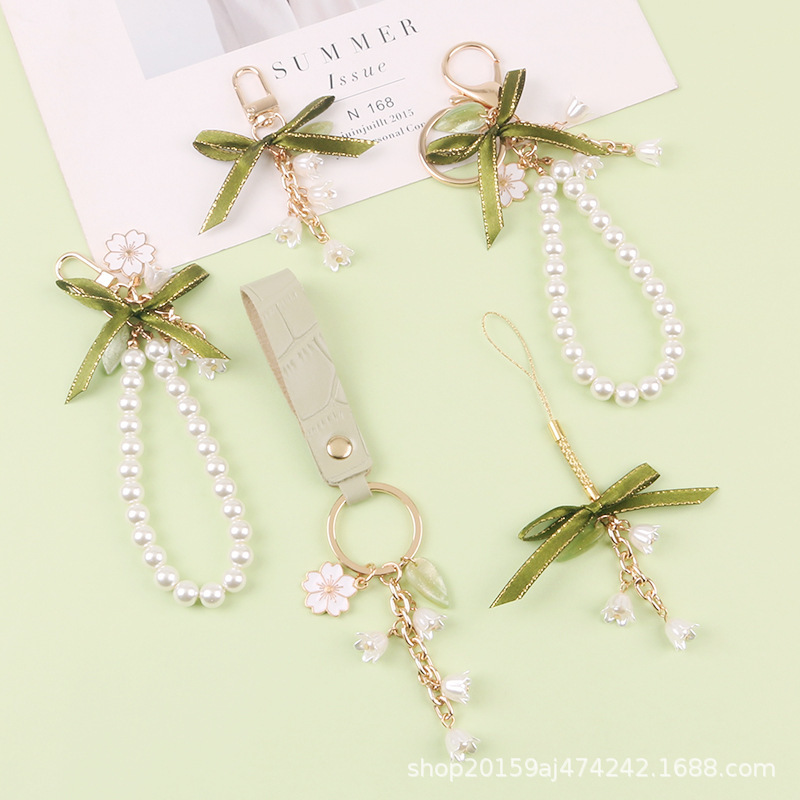 New Green Ribbon Car Keychain Pendant Creative Lily Flower Pearl Chain Pendant Earphone Case Bag Decoration
