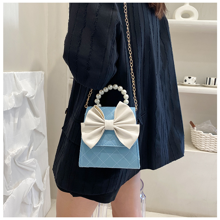 Nihaojewelry Retro Rhombus Chain Bow Pearl Messenger Handbag Wholesale display picture 19