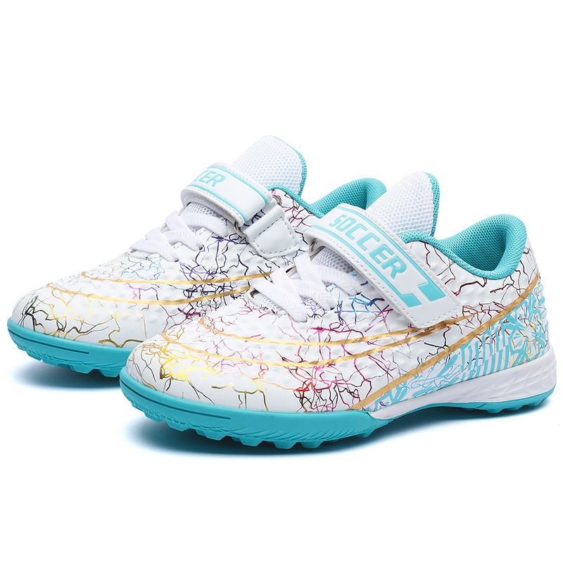 Nuevos zapatos de fútbol transfronterizos para niños tf clavos jóvenes zapatos de entrenamiento de combate profesional zapatos deportivos artificiales para niñas