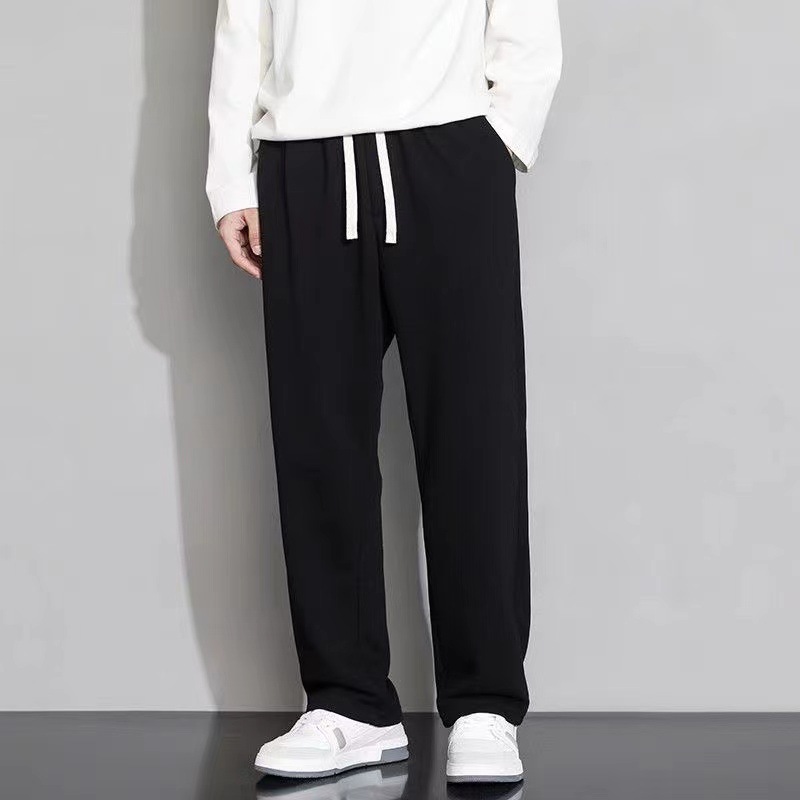 Venta al por mayor pantalones casuales hombres cuatro estaciones nueva moda recta suelta Pantalones deportivos nueva pierna ancha negro pantalones largos hombres