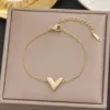 【568】 Arc V bracelet golden color