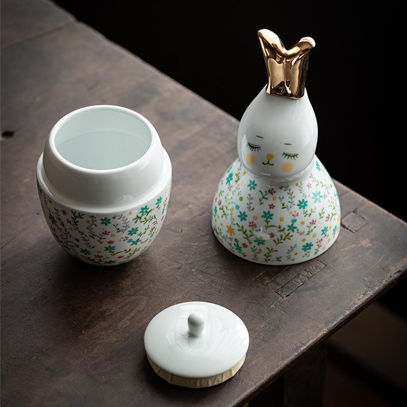 Creativo francés floral conejo té tarro con la selección de té de cerámica dibujo de oro conejo decoración sellada empresa regalo de vacaciones