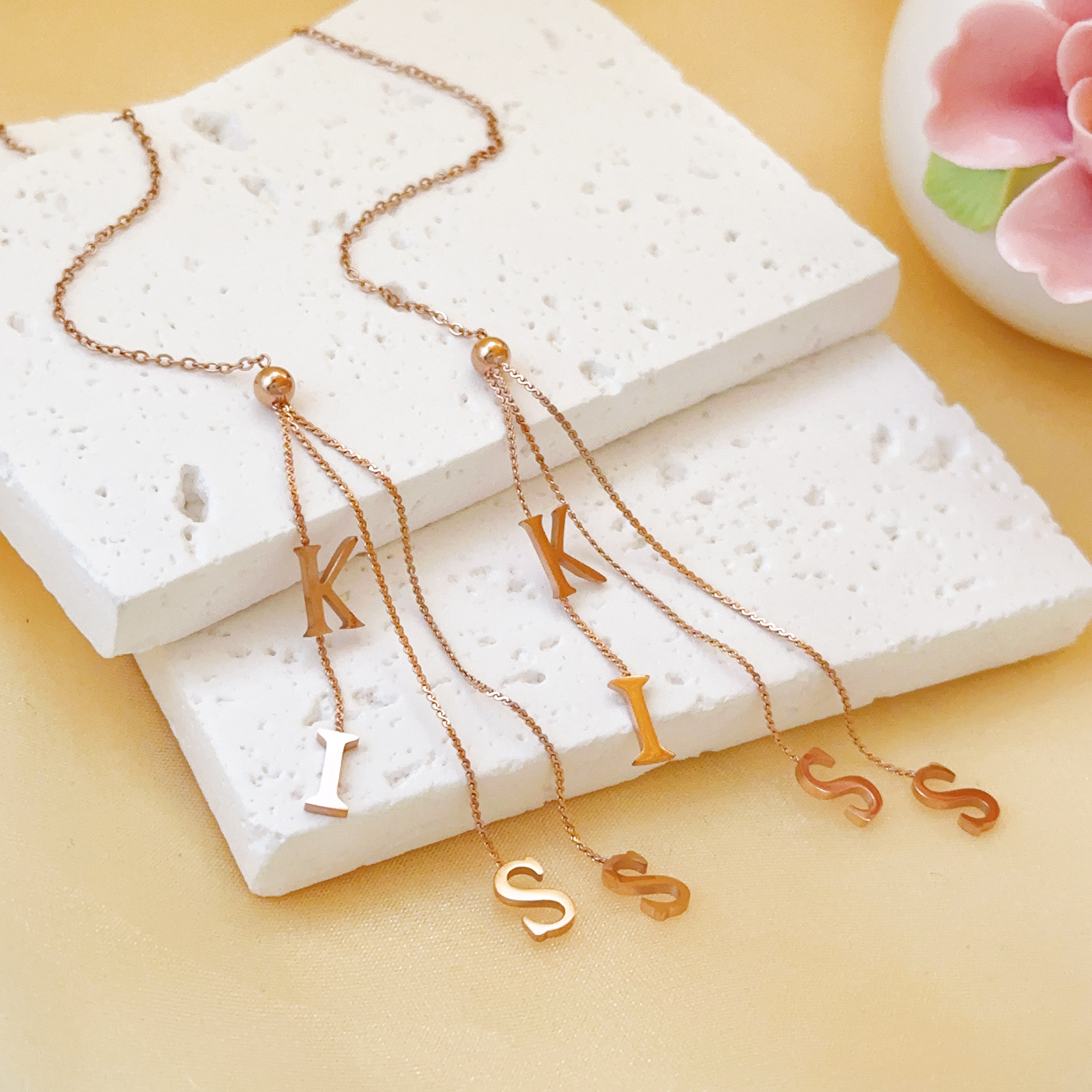 KISS estilo francés temperamento simple orejas de oro rosa alta sensibilidad mujer acero inoxidable titanio orejas de acero bordas largas