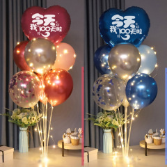 赤ちゃんの百日間の装飾のテーブルを配置します。