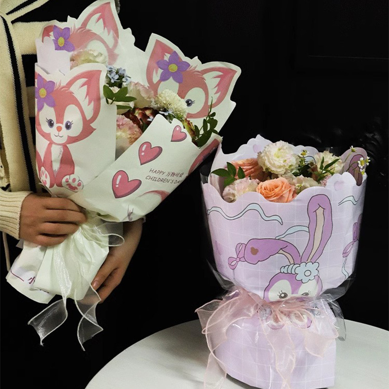 Día de los niños papel de embalaje al por mayor dulces bocadillos ramo de papel de embalaje de dibujos animados arte floral día feliz papel de embalaje de flores