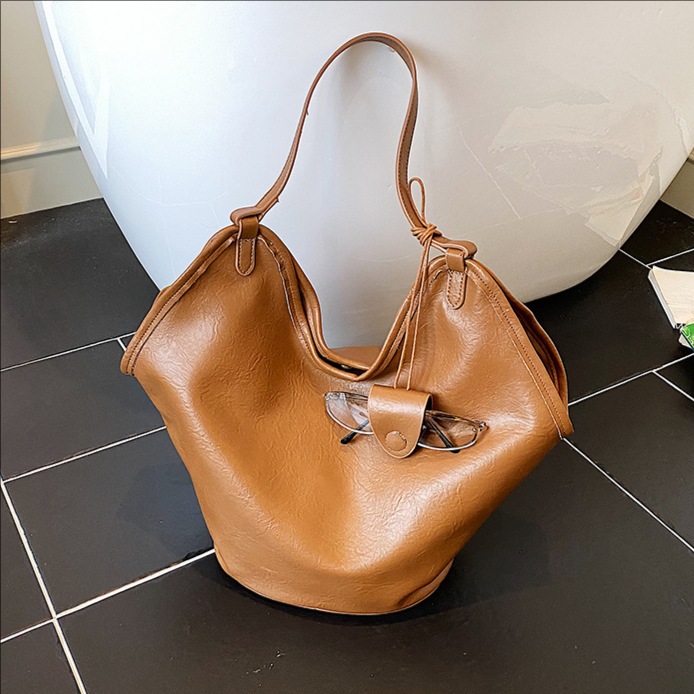 Bolsa de cubo transfronteriza de gran capacidad, bolsa de viaje retro de mujer 2025, otoño y invierno, nueva moda, bolsa de brazo, bolsa de hombro universal