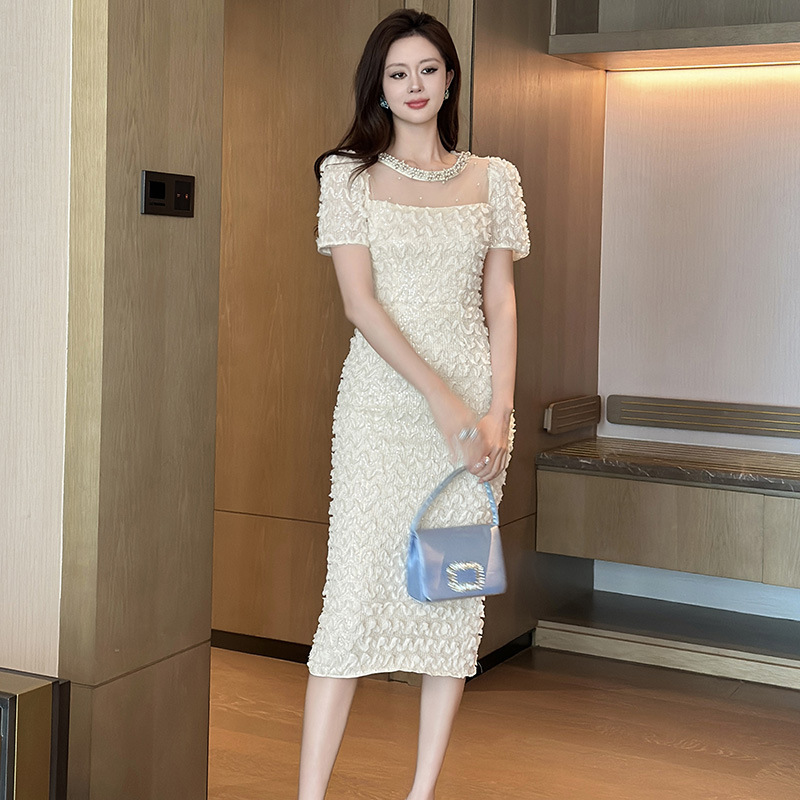 今年の人気スカート 2025 夏の新作婦人服フレンチラウンドネックスリムアプリコットドレス 21737|undefined