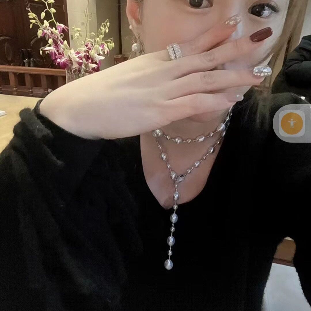 Barroco perla larga cadena de suéter cadena de collar cadena de clavícula un temperamento de uso múltiple 758 cuero artificial