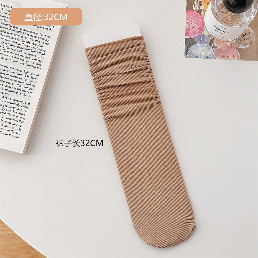 Calcetines de hielo calcetines de terciopelo de primavera y verano para mujer medias de media pantorrilla calcetines de JK largos blancos puros calcetines de moda al por mayor