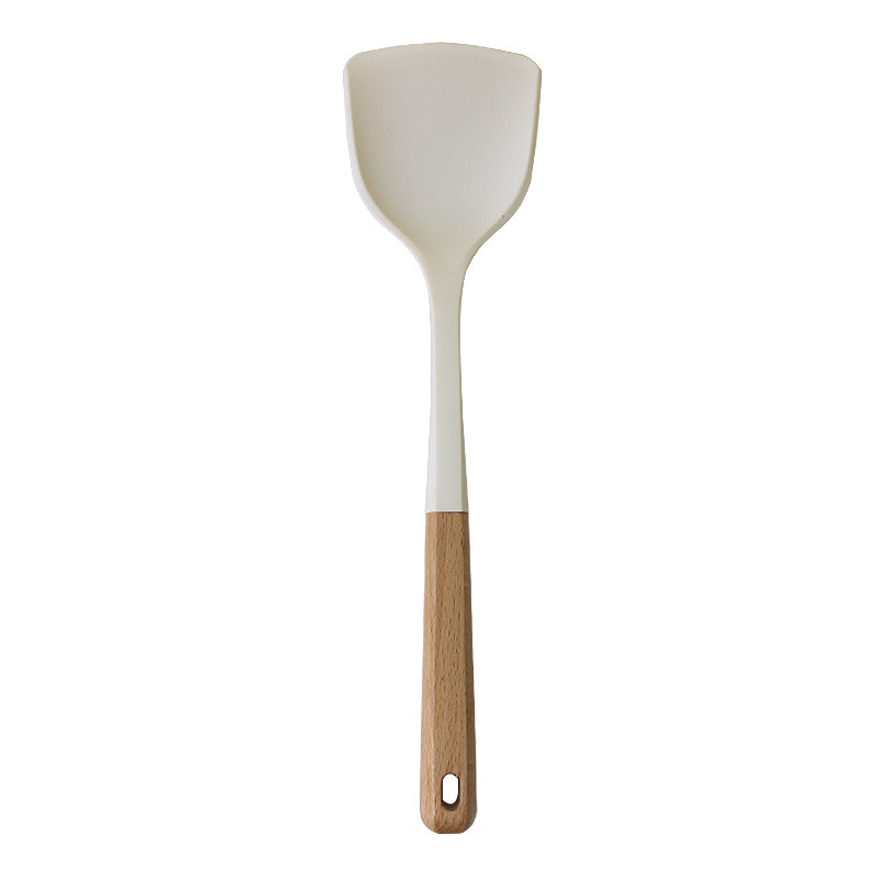 Cuchara de sopa de espátula de silicona transfronteriza Juego de 13 piezas de sartén antiadherente Pala de silicona de grado alimenticio Juego de utensilios de cocina de silicona blanca lechosa al por mayor