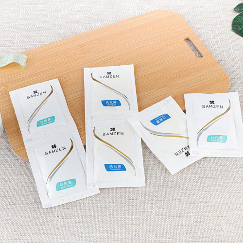 Hotel guest room toiletries disposable bags, bottles, tubes, shampoo, shower gel, conditioner