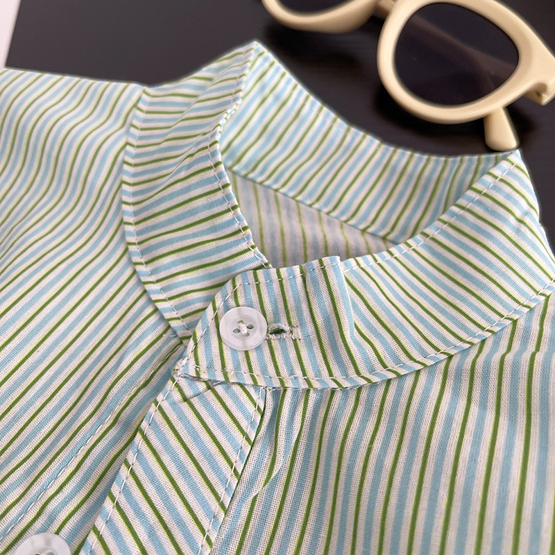 Camisa para niños primavera y otoño 2025 nuevo estilo a rayas para niños chaqueta de punto de manga larga Baita para niños con sal de otoño