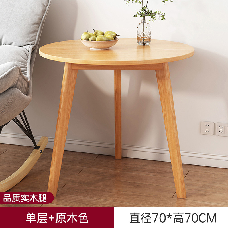 Sofá de la sala de estar pequeña mesa redonda doméstica, estante de cabecera de cama moderno y minimalista, mesa de té creativa con balcón