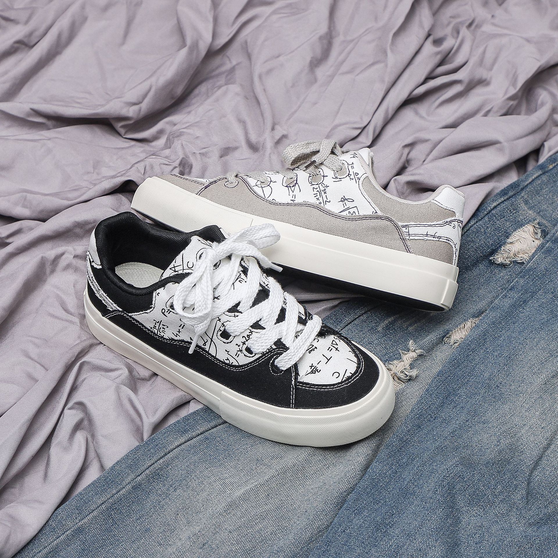 2025 verano nuevos zapatos de lona transpirables para hombres graffiti zapatos de skate para hombres nicho de diseño zapatos de pan zapatos de moda zapatos de hombre