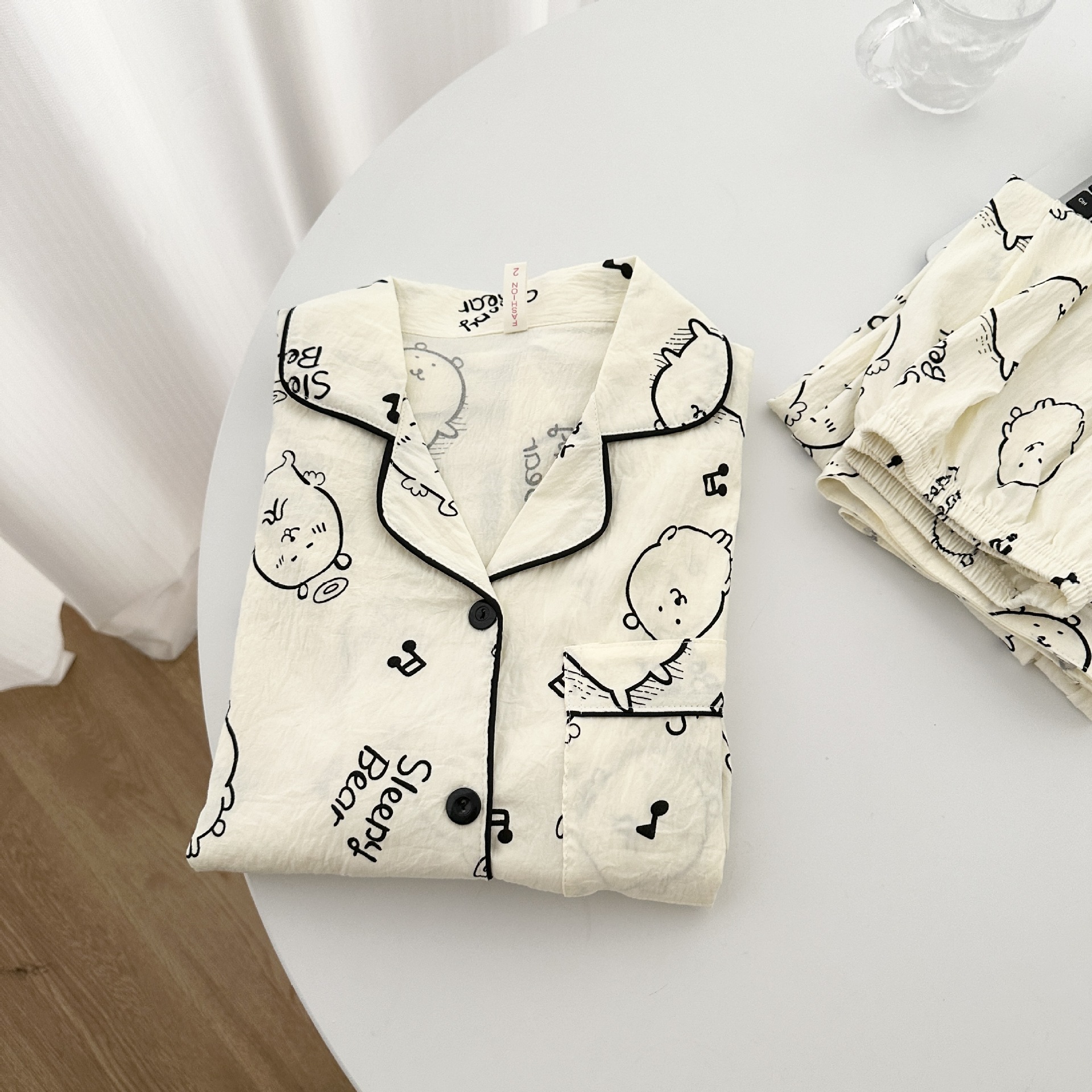 Pijamas al por mayor transfronterizos de primavera y otoño nubes de algodón ropa doméstica pantalones de manga larga dibujos animados autocriticia oso nuevo conjunto