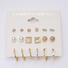 Metal earrings from pearl, set, wholesale, 9 pair, cat's eye
