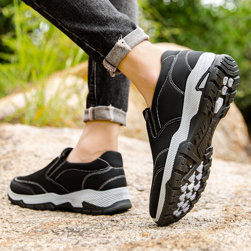 Venta al por mayor primavera nuevos zapatos de hombre zapatos casuales transpirables zapatos deportivos individuales zapatos de tela de todo fósforo zapatos de hombre transfronterizos de tendencia casual