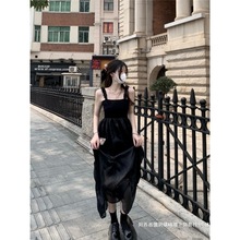明星同款黑色吊带连衣裙2025夏季新款网纱拼接显瘦蓬蓬裙中长裙