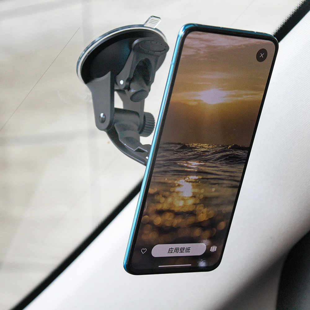 Soporte para teléfono móvil para automóvil explosivo transfronterizo tipo ventosa soporte para automóvil magnético fuerte estante de navegación para automóvil multifuncional al por mayor