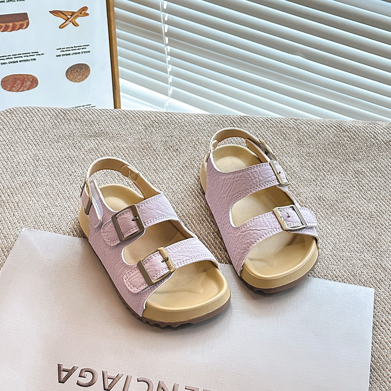 2026 verano nuevas sandalias de niñas con cabeza hueca coreana zapatos de princesa para niños zapatos de playa suaves antideslizantes