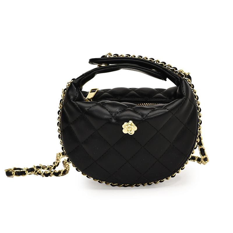 El popular bolso para niños mini camelia de este año 2024 nuevo bolso de cadena de diamante de textura de estilo nuevo bolso de niña de cambio de mensajero