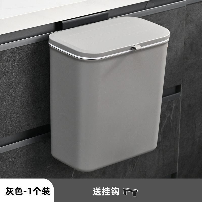トイレのゴミ箱の壁掛け式の穴を開けない家庭用のふたをひっくり返します。|undefined