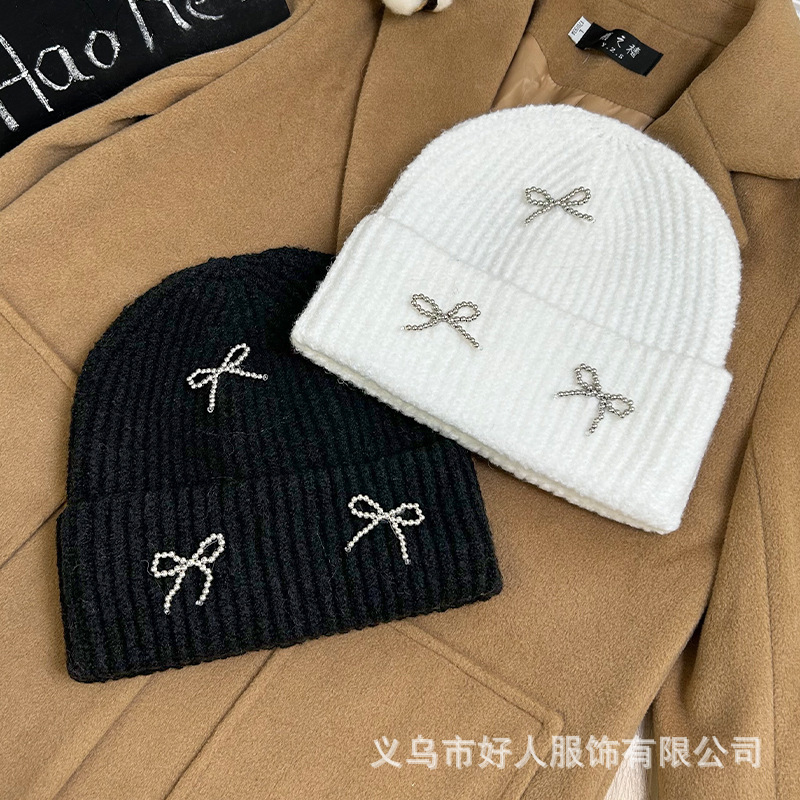 韓国版のファッションの新型の小さい香風の真珠の蝶結びの毛糸の帽子の大きい頭の周りの耳のメリヤスの冷たい帽子の頭の帽子の潮|undefined