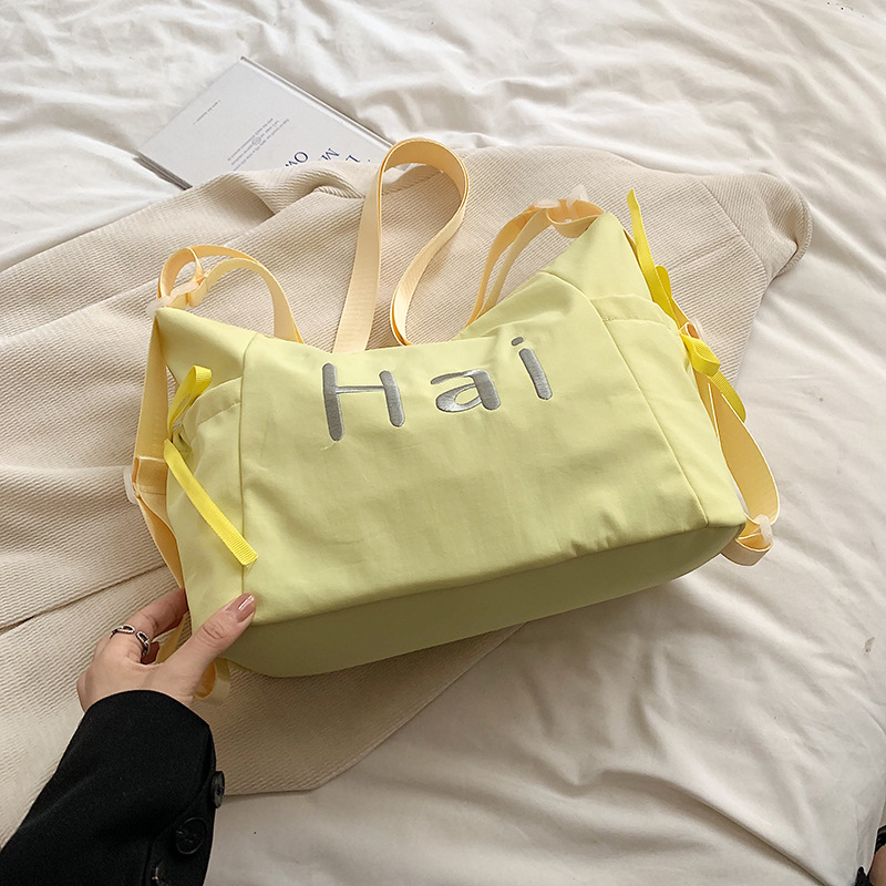 Bolsa de lienzo de letras de la escuela de verano 2024 nueva moda coreana nicho bolso tote de gran capacidad mochila