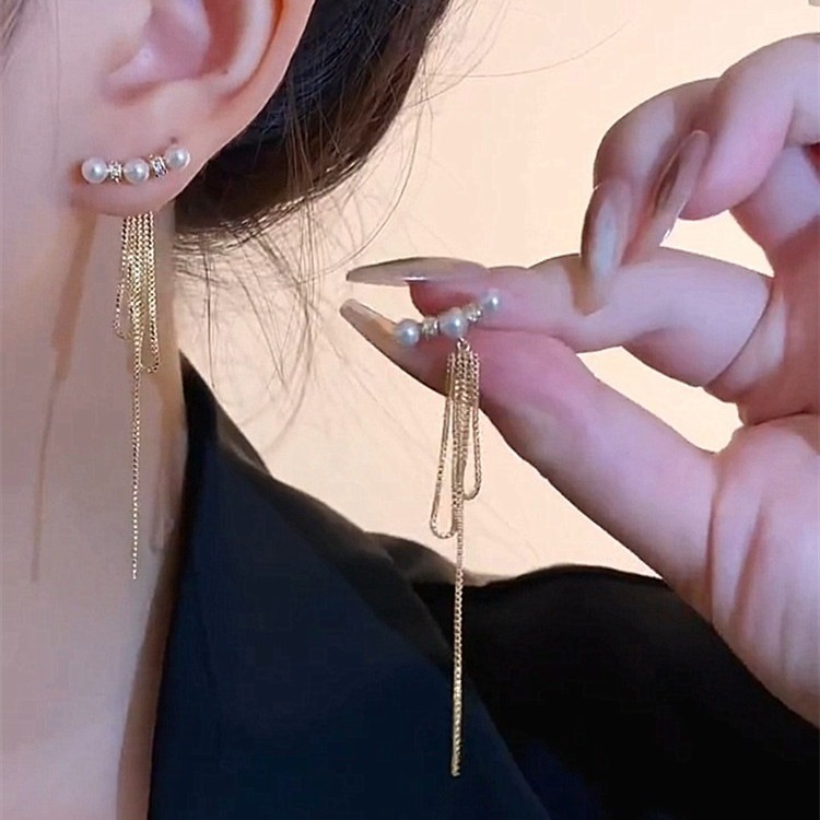 Elegant small design long earrings with tassels with zircon