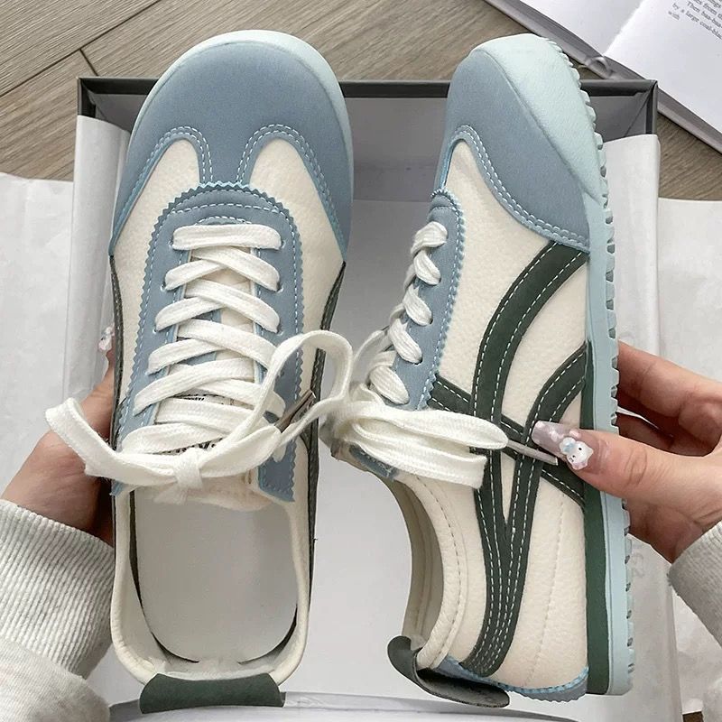 Zapatos de entrenamiento alemanes con cordones zapatos blancos planos mujeres 2025 otoño nuevo estilo coreano zapatos casuales zapatillas de deporte para estudiantes mujeres