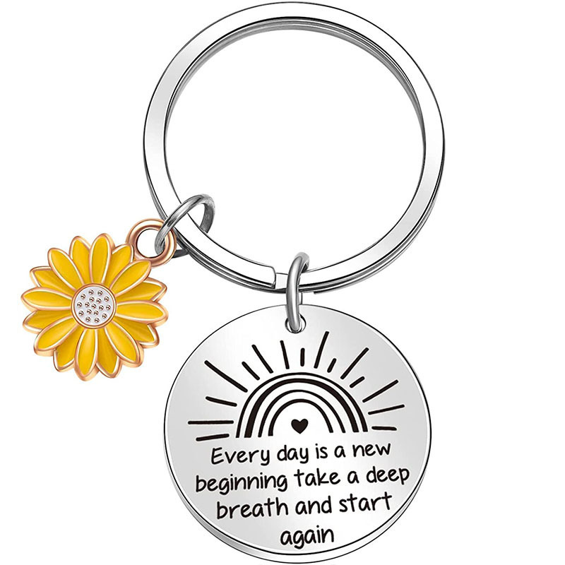 Eenvoudige Stijl Bloemen Titanium Staal Vrouwelijk Tas Hanger Sleutelspeelgoed display picture 3