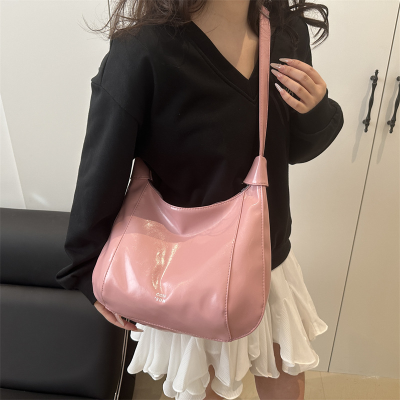 relajado cera de piel bolso de mujer 2025 nuevo estilo primavera y verano de moda de viaje bolsa de mano ocio versátil mochila