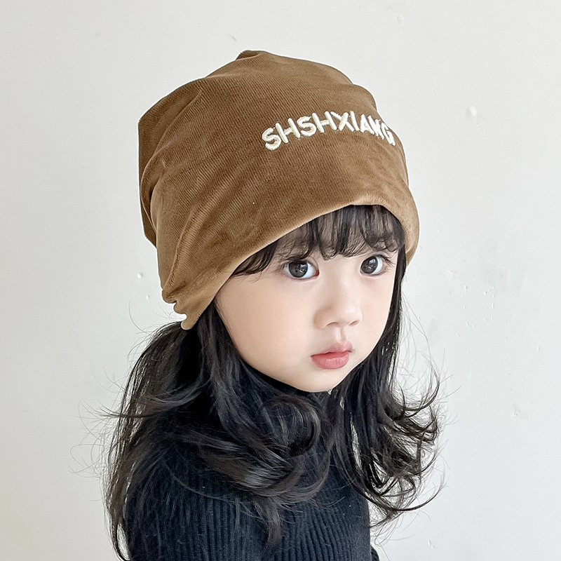 Hombres y niñas sombreros de moda de otoño de algodón húmedo para niños estilo extranjero sombreros de pila de estilo jardín de infantes negros a prueba de viento orejas