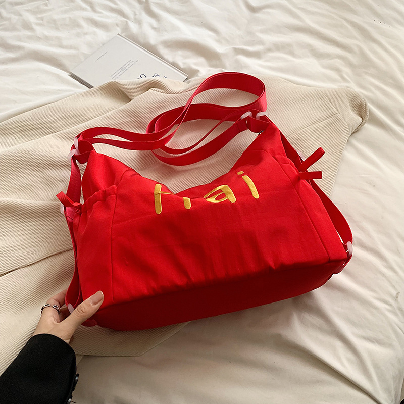 Bolsa de lienzo de letras de la escuela de verano 2024 nueva moda coreana nicho bolso tote de gran capacidad mochila
