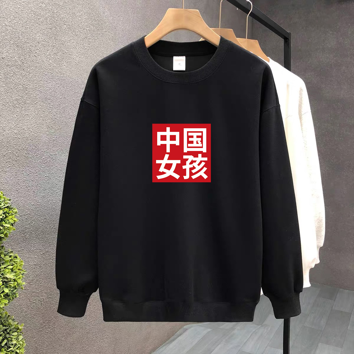 Suéter de algodón negro pesado de alta gama para mujeres 2025 otoño y invierno nuevo estilo europeo y americano camiseta de manga larga fondo suéter de estudiante