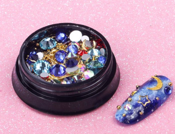 Joyas de belleza de uñas de la estrella y la luna, remaches de estampado de oro, bolas de acero mezcladas con anillo de metal, diamante de agua, diafragma de aleación hueca japonesa