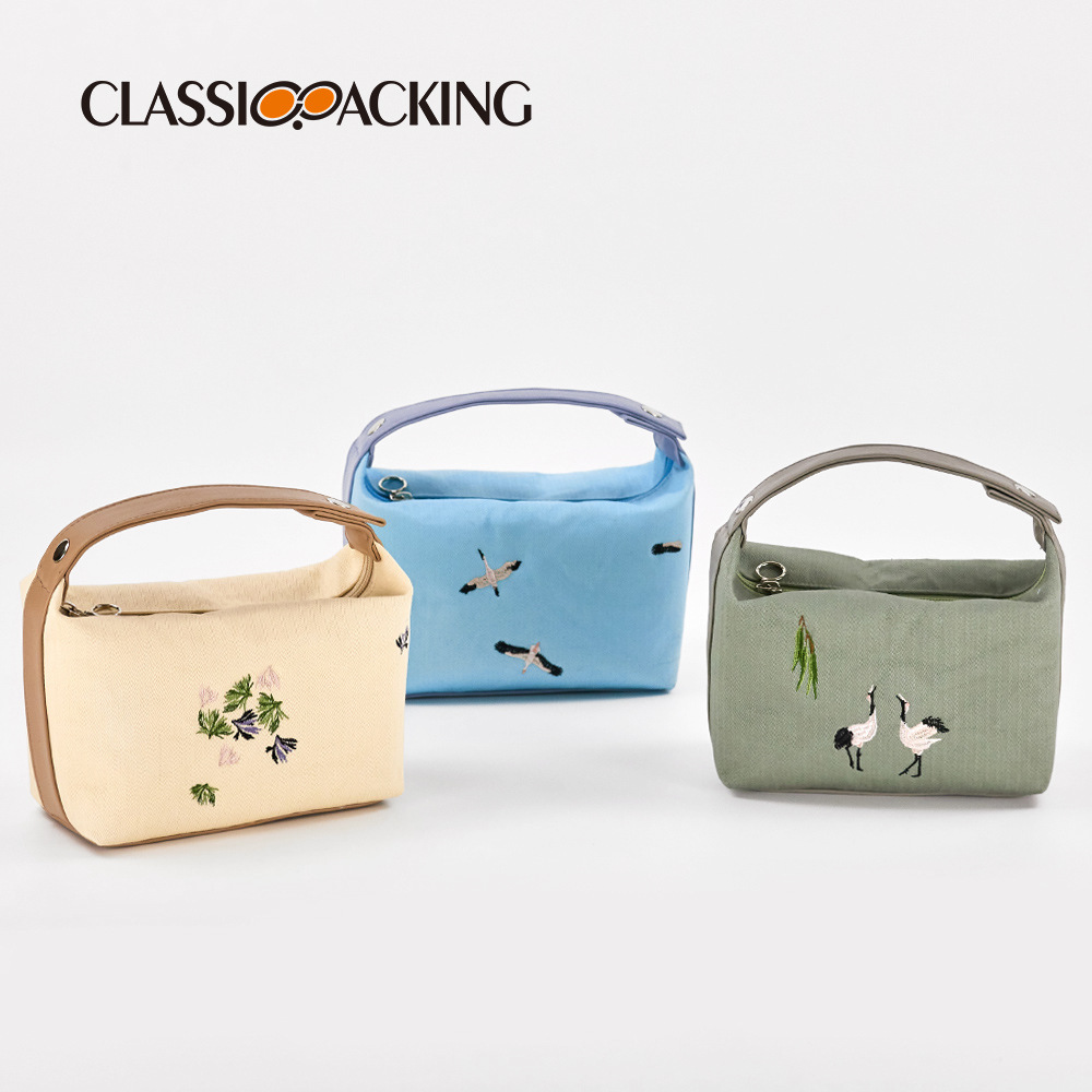 Bolso de mano cosmético de estilo nacional con LOGOTIPO impreso Bolso de lona de alta apariencia portátil del todo-fósforo del arte del bordado