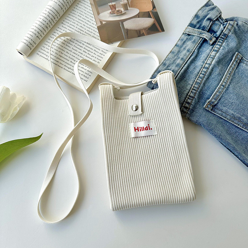 Primavera nuevo color sólido de punto de hombro mochila bolso móvil de moda versátil bolso de dopamina para hombres y mujeres