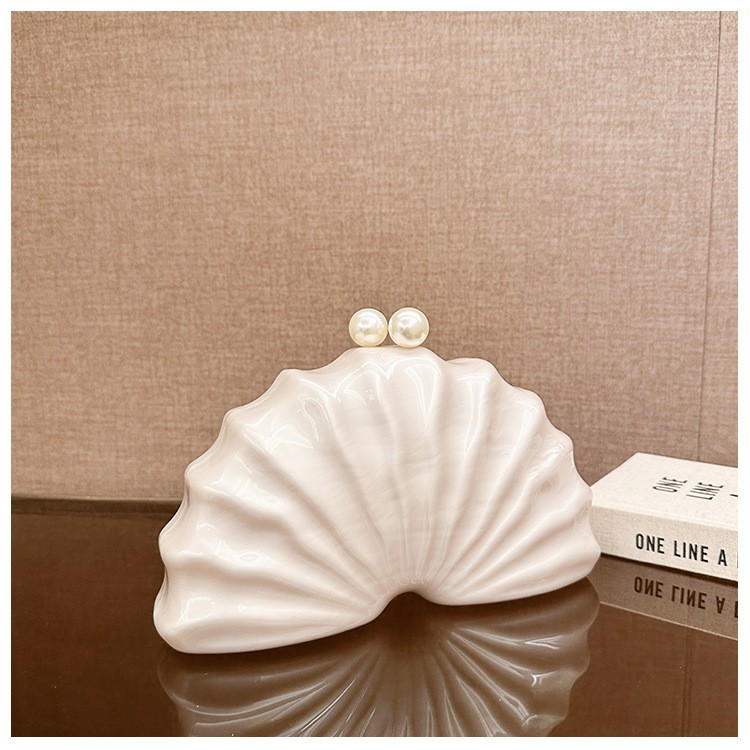 Europa y los Estados Unidos nuevos paquetes de cena de damas de hombro único en forma de concha acrílica de mano de lujo ligero paquete de moda de noche