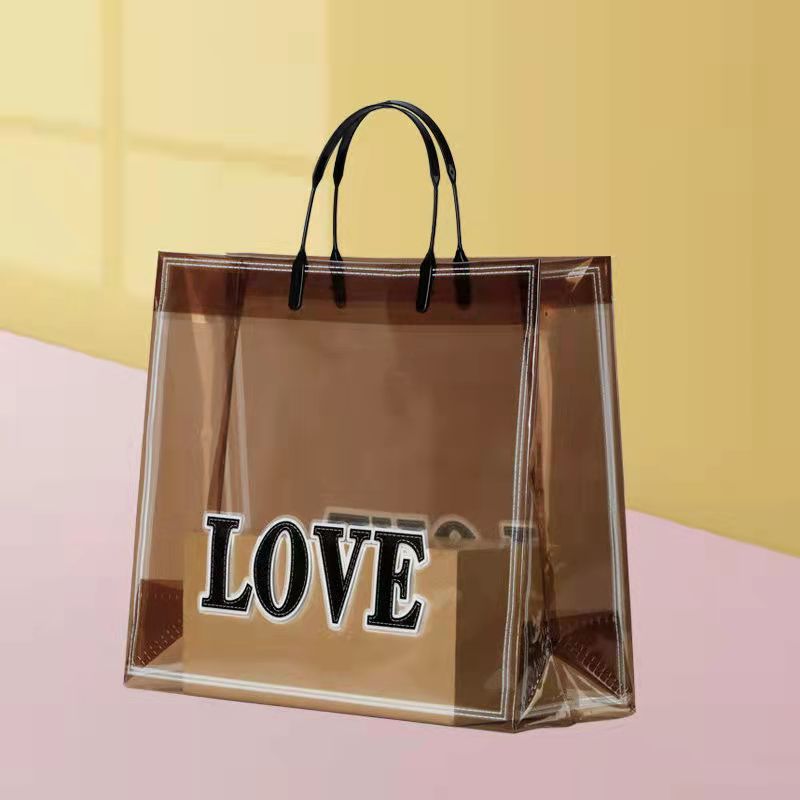 Bolso transparente de PVC bolsa de regalo tienda de ropa bolsa de plástico engrosada logotipo impreso bolsa de compras al por mayor image 8