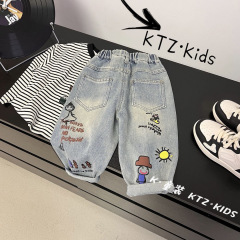 25子供用トレンドファッションジーンズ春秋長ズボン新作子供用春服パンツゆったり子供用グラフィティ長ズボン