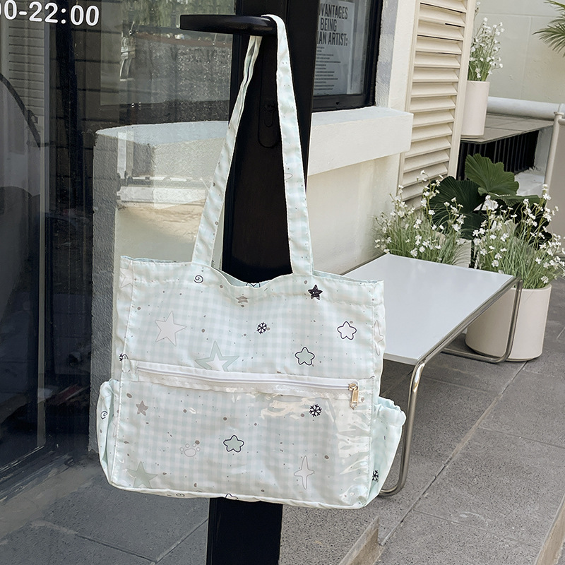 Bolso japonés simple y versátil transparente pequeño fresco estampado dulce 2025 niña dibujos animados leche huhutote bag