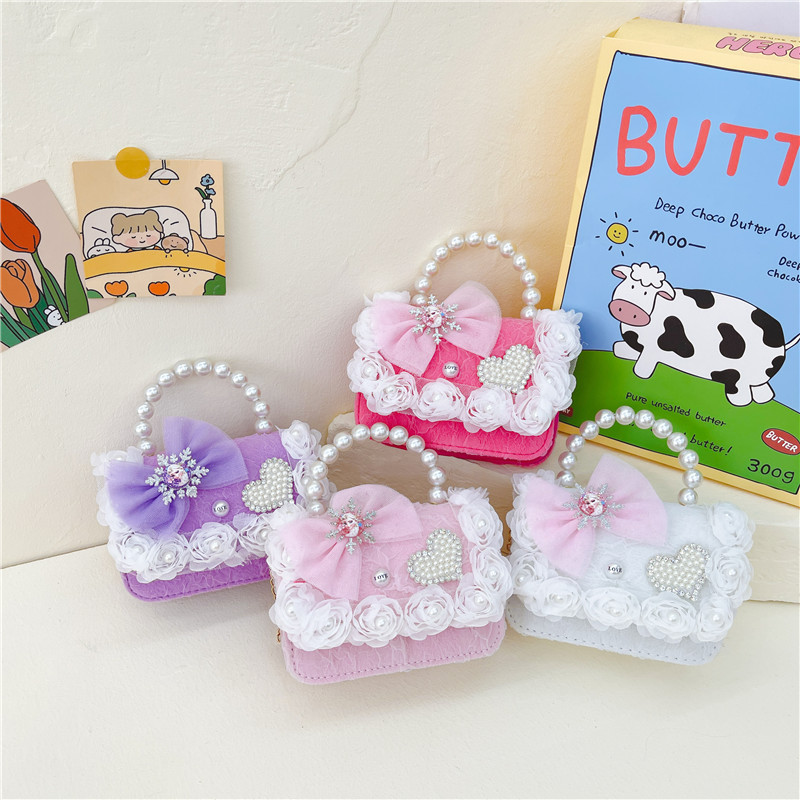 Nuevo en línea rojo perla portátil bolso de los niños lindo suave lindo dibujos animados moda mensajero bolsa niña estilo occidental bolso de hombro