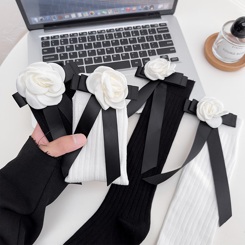 Camellia black bow calf socks Japanese style small fragrant girl middle tube retro Lolita pure desire calf socks