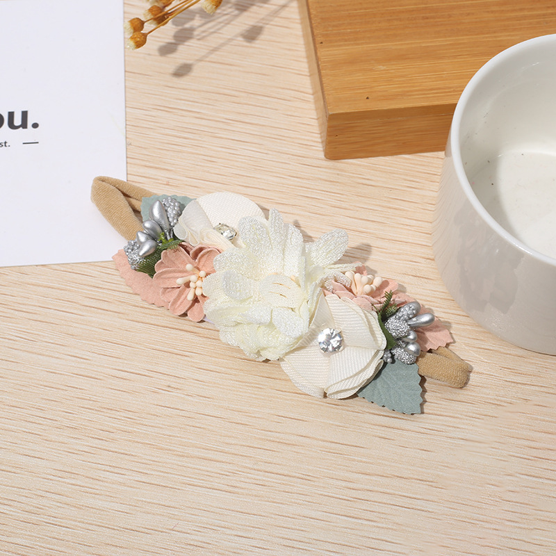 Fábrica al por mayor nuevo estilo pastoral de nylon Flor del pelo del bebé banda fresca foto accesorios para el cabello