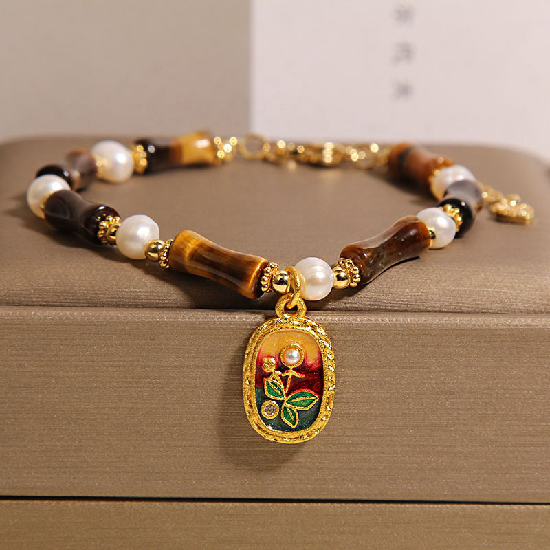 Nueva pulsera china de bambú de piedra de ojo de tigre, colgante de pintura al óleo de perlas de nicho de lujo ligero femenino, pulsera de estilo nacional, joyería de alta calidad