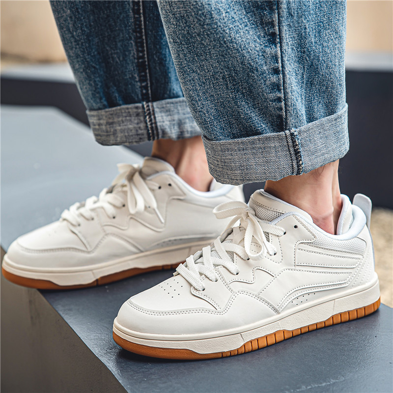 Verano nueva moda casual Sneaker hombres zapatos de tablero de estudiante bajo Top estilo Hong Kong moda retro blanco zapatos